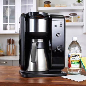 Sponge and Vinegar for How to Clean a Coffee Maker