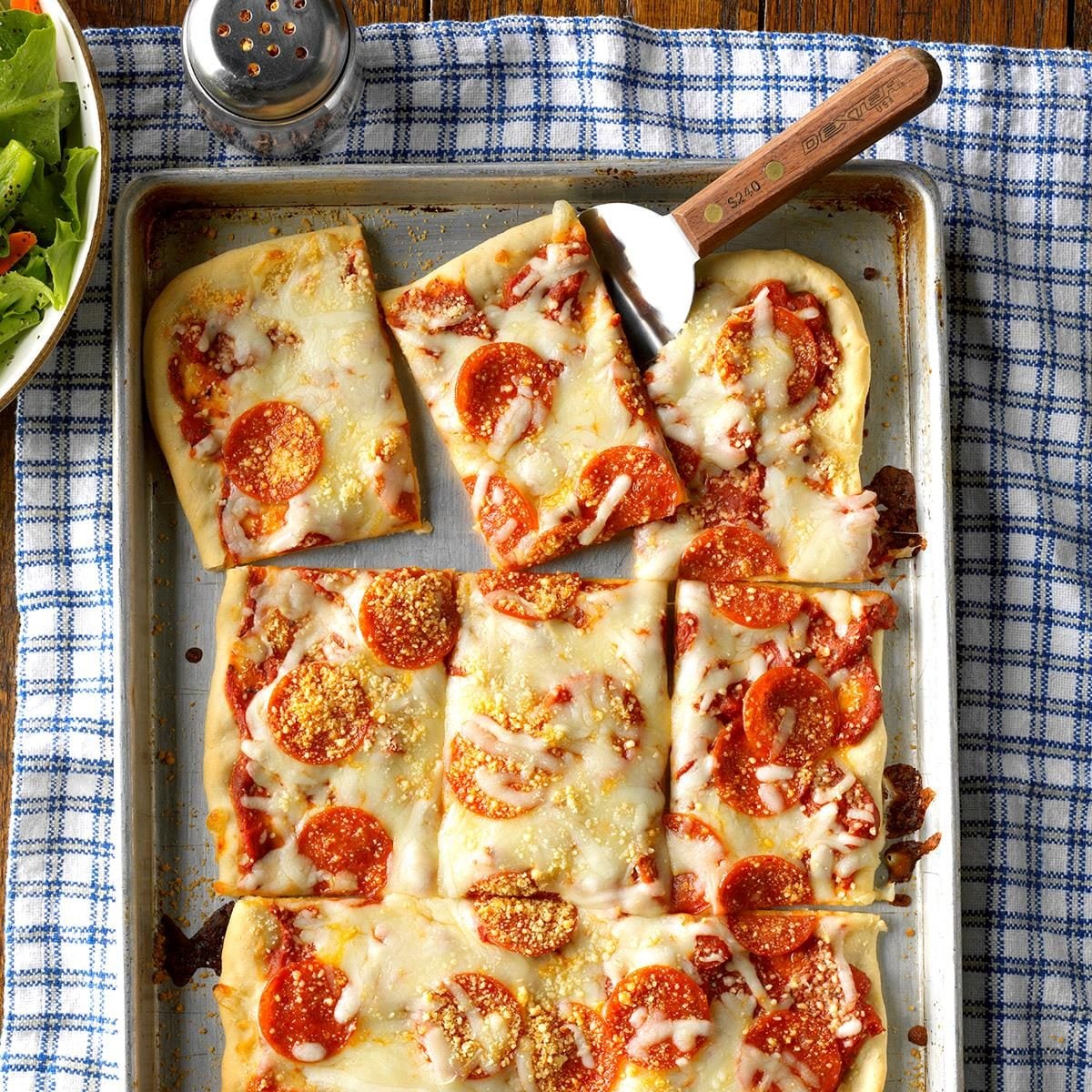 pepperoni pizza on a sheet pan