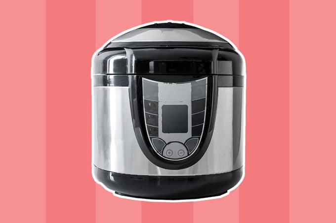 Electric pressure cooker isolated on a white background; Shutterstock ID 340132283