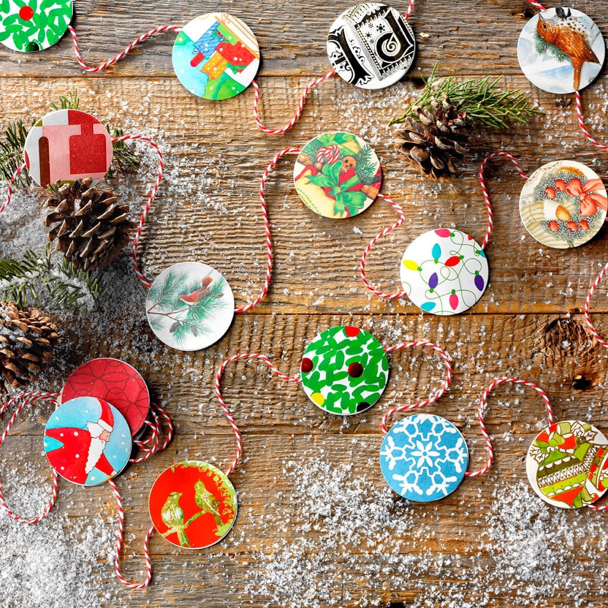 Garland with circular Christmas card cutouts decorating it