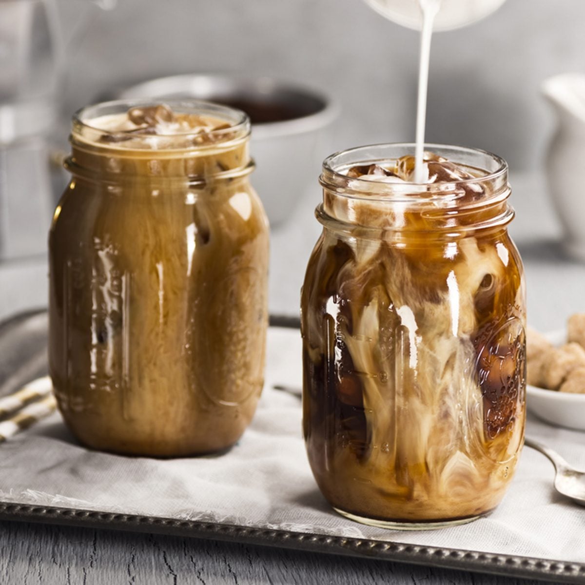 Milk Being Poured Into Iced Coffee; Shutterstock ID 262673684; Job (TFH, TOH, RD, BNB, CWM, CM): TOH