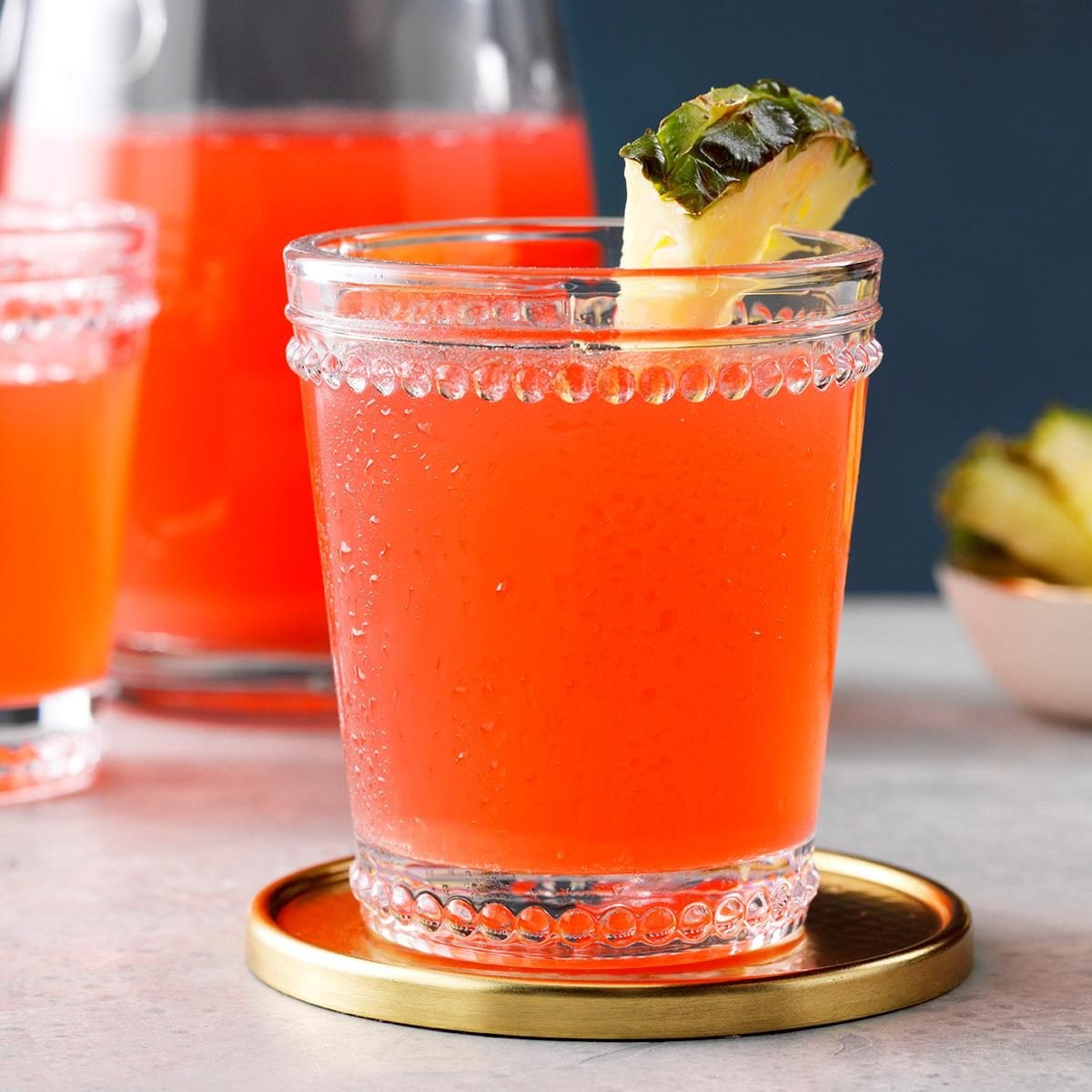 a glass of pink rhubarb punch