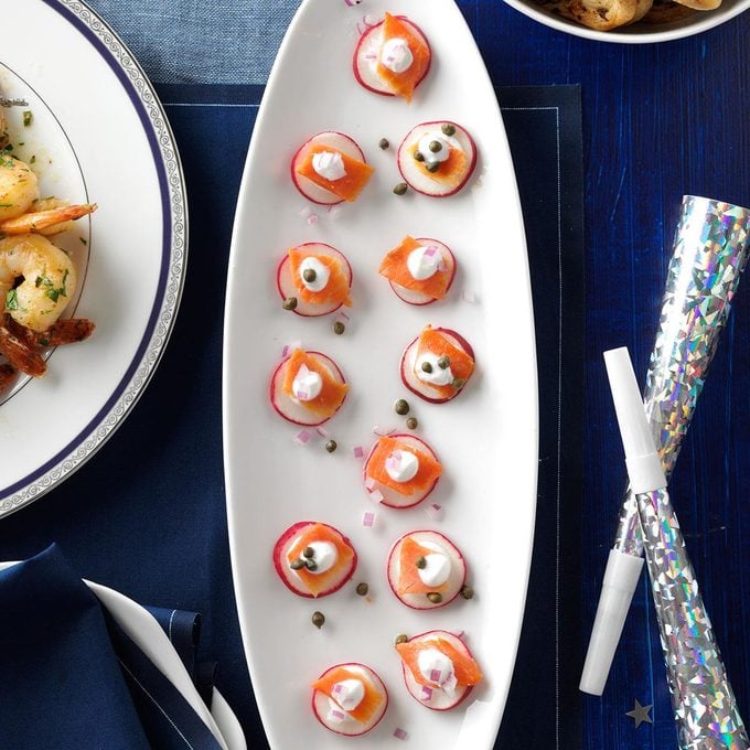 salmon bites with capers on top