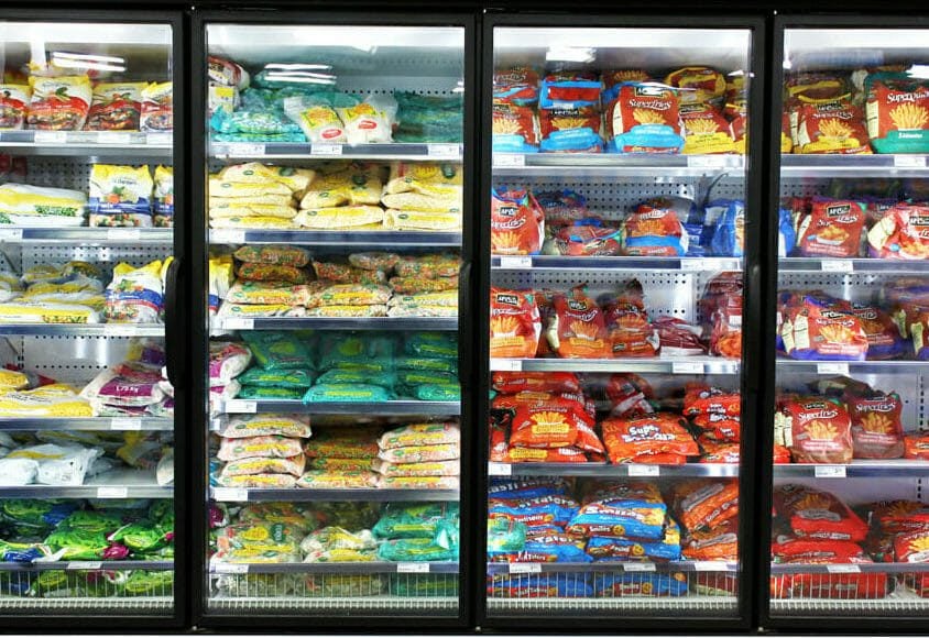 Frozen foods on shelves in a supermarket. In North America, consumption of frozen food has increased in recent years, mostly due to people