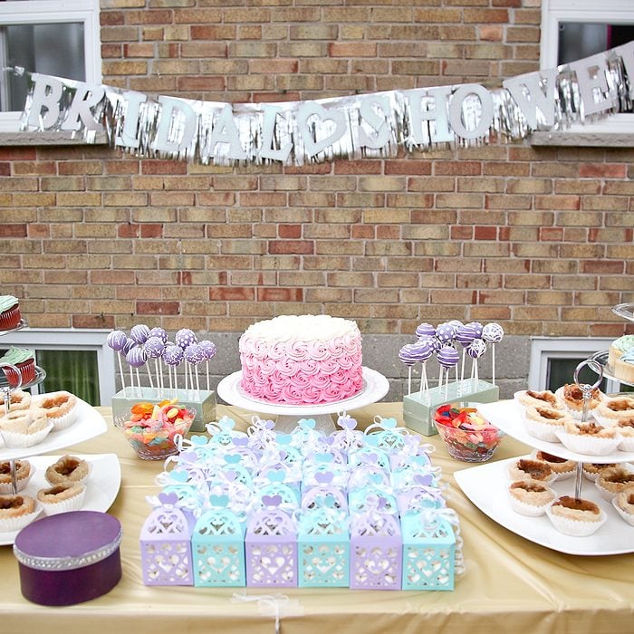 bridal shower party dessert table with party favors