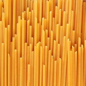 Uncooked spaghetti noodle abstract; 