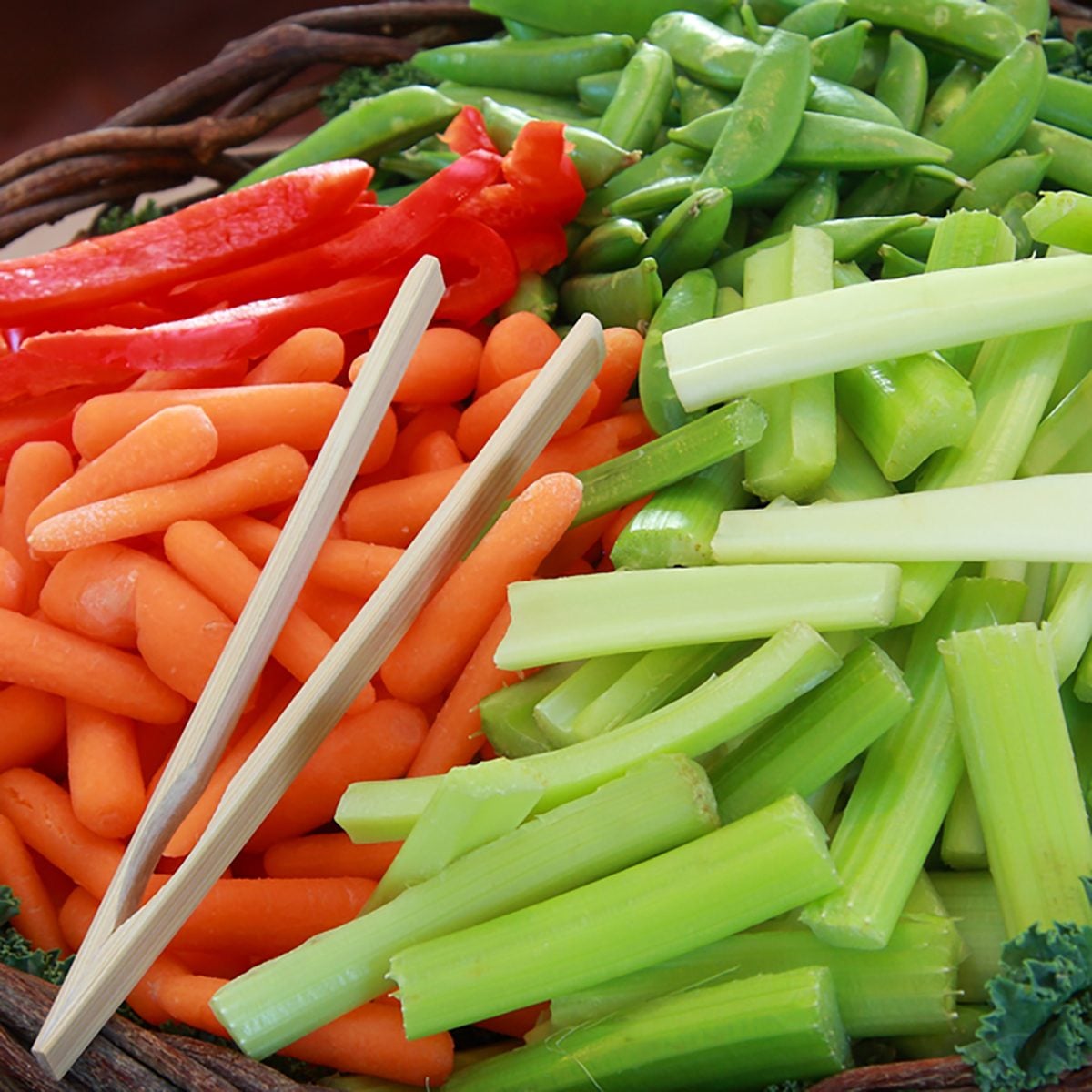 Fresh vegetables prepared and displayed in a basket for serving