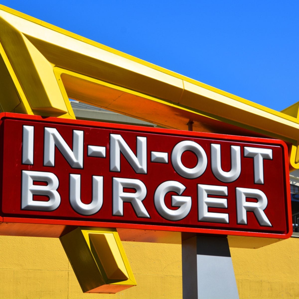 Sign of In-N-Out Burger is an American regional chain of fast food restaurants
