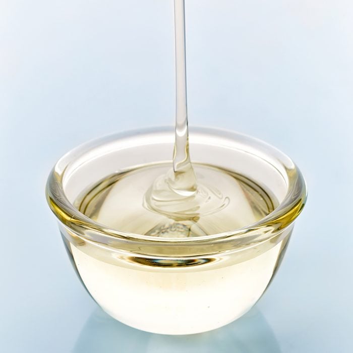 sugar syrup pouring into glass bowl