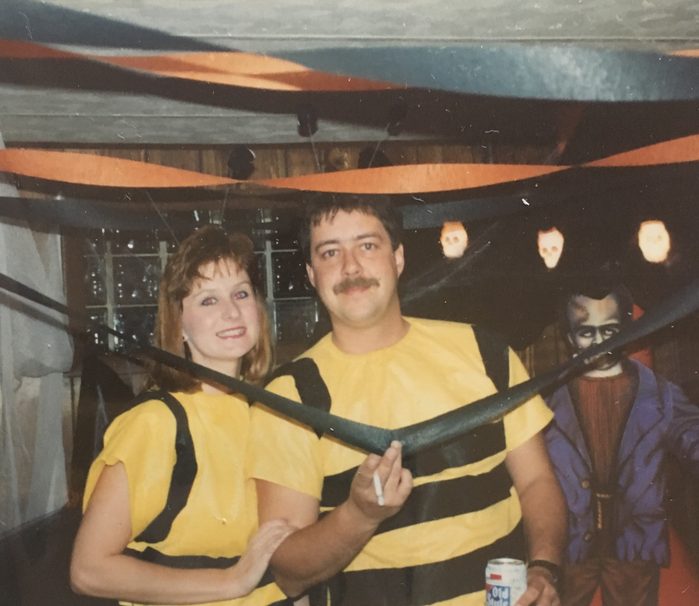 two people dressed in bee Halloween costume