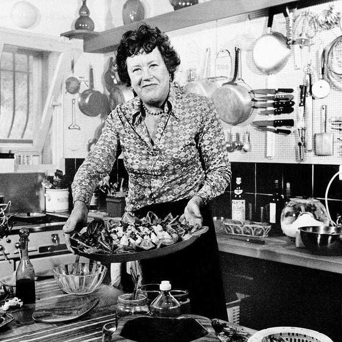 Child American television chef Julia Child shows a salade nicoise she prepared in the kitchen of her vacation home in Grasse, southern France