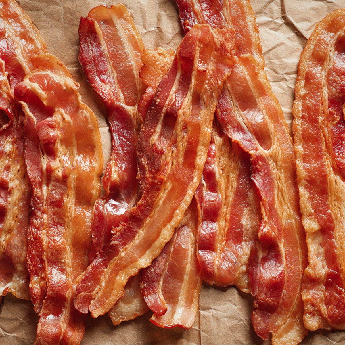 Cooked bacon rashers on parchment