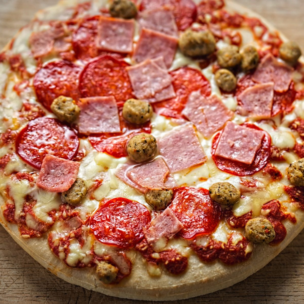 Pan baked meat feast pizza