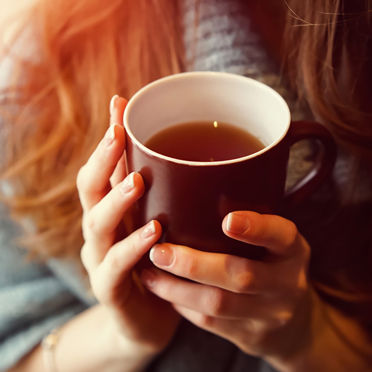 Drink Tea relax cosy photo with blurred background.