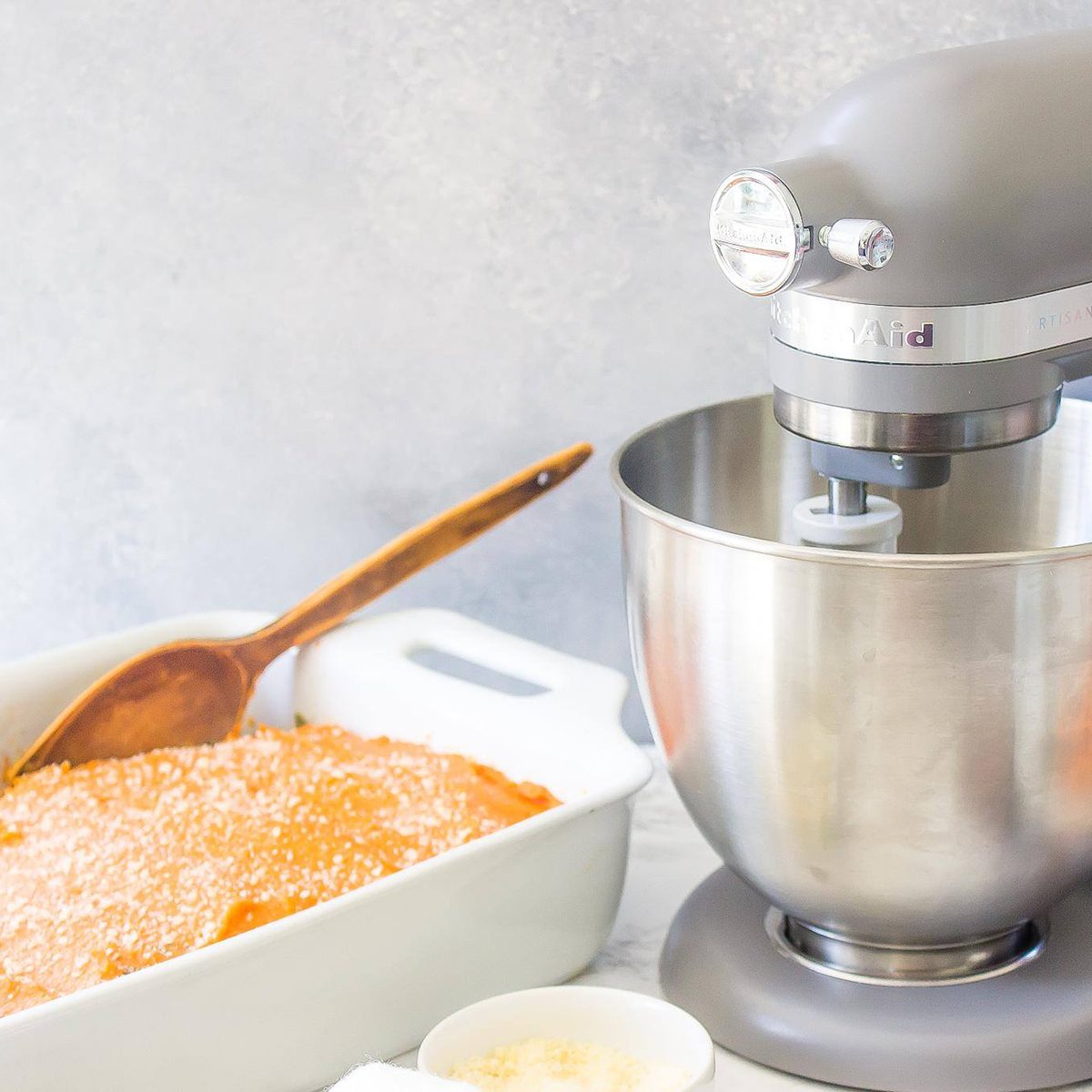 silver KitchenAid mixer with sheperds pie