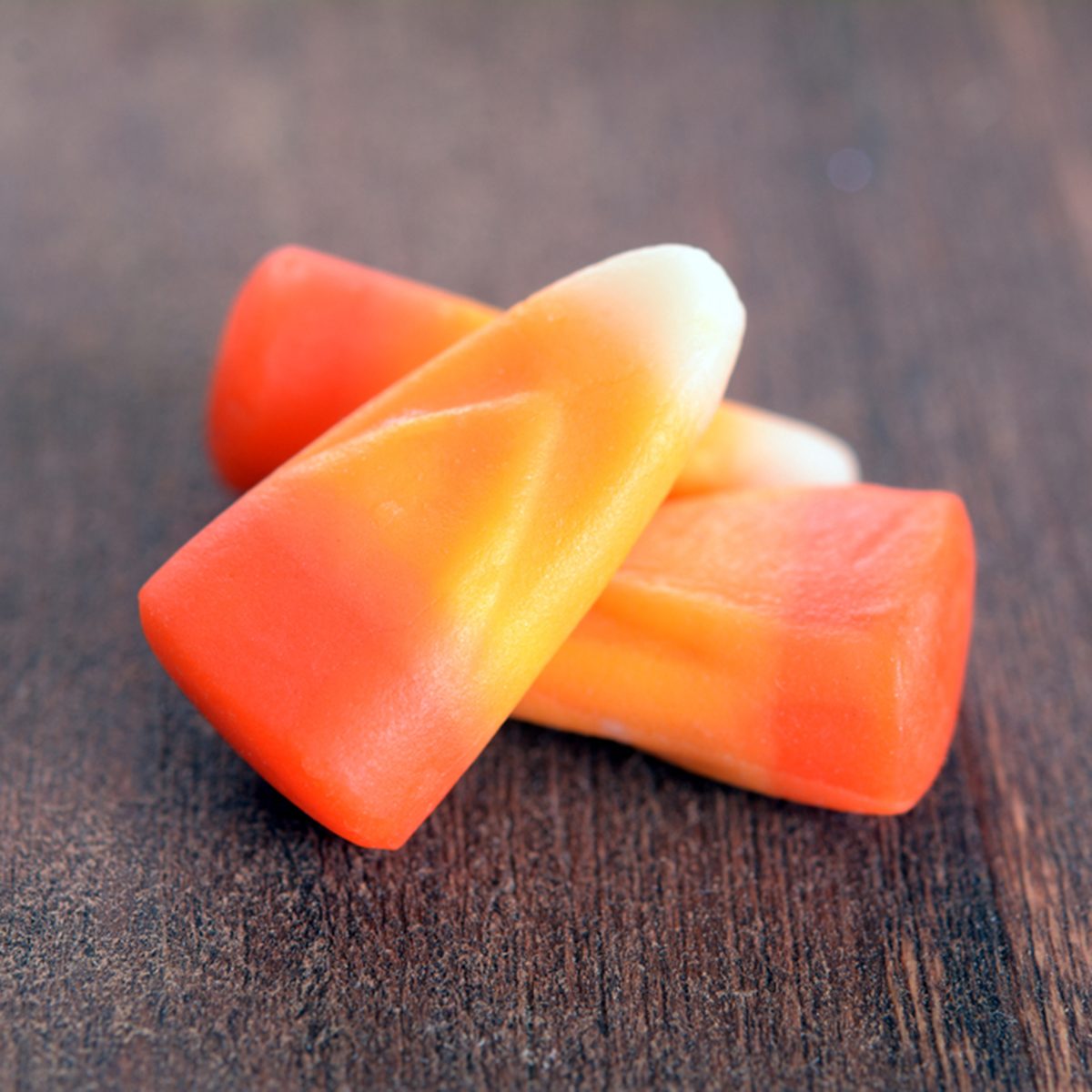 candy corn for Halloween on rustic table