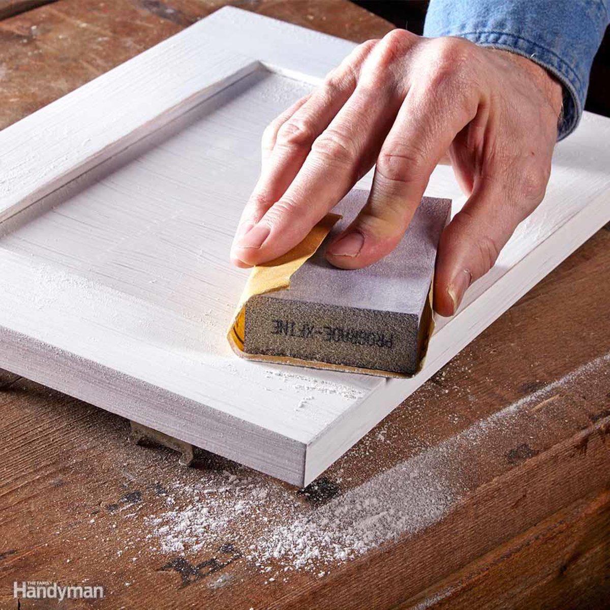 Lightly sanding wood