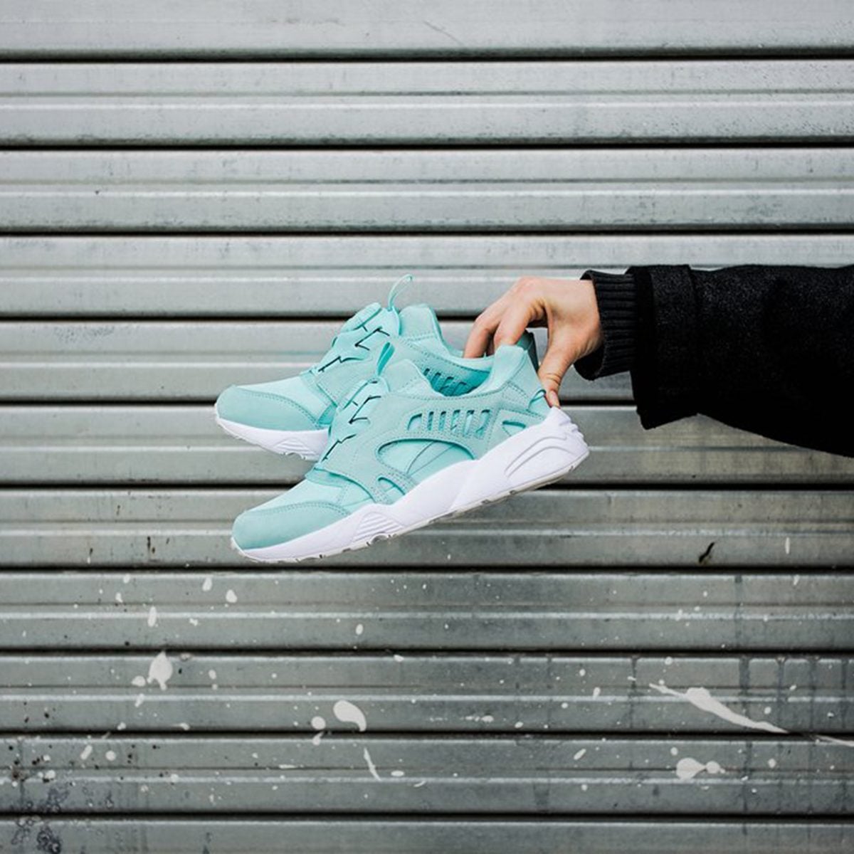 Holding sneakers