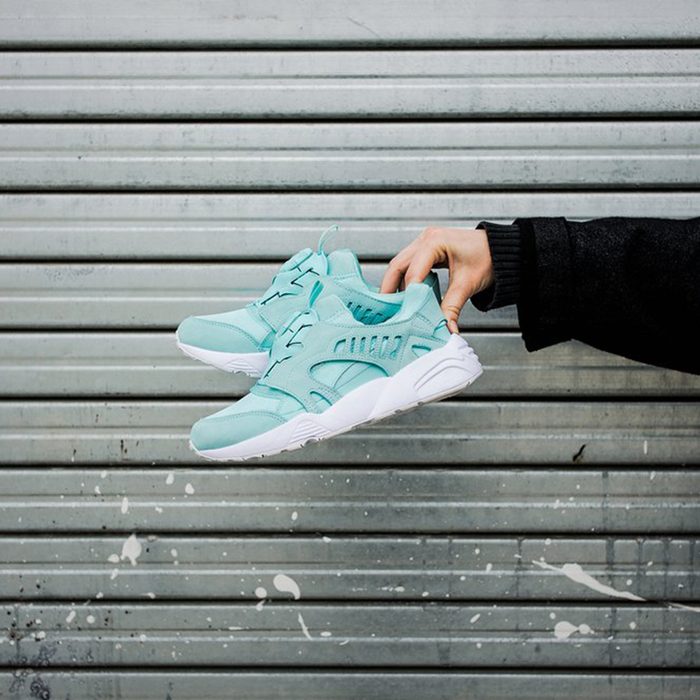 Holding sneakers