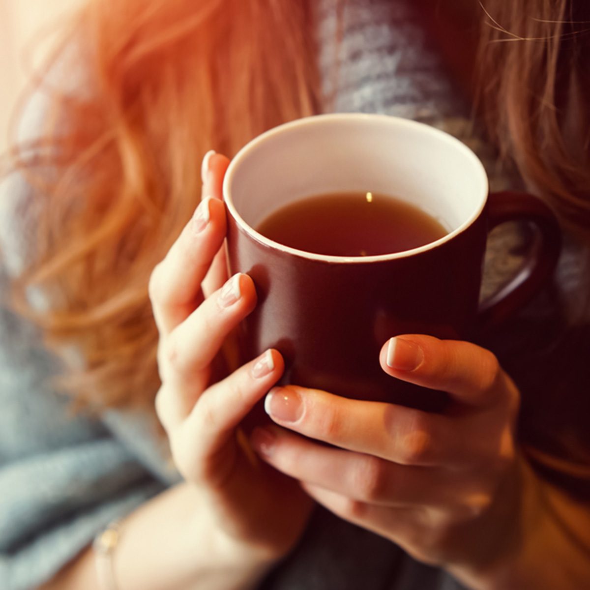 Drink Tea relax cosy photo with blurred background.