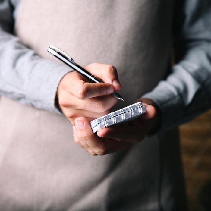 Waiter taking notes