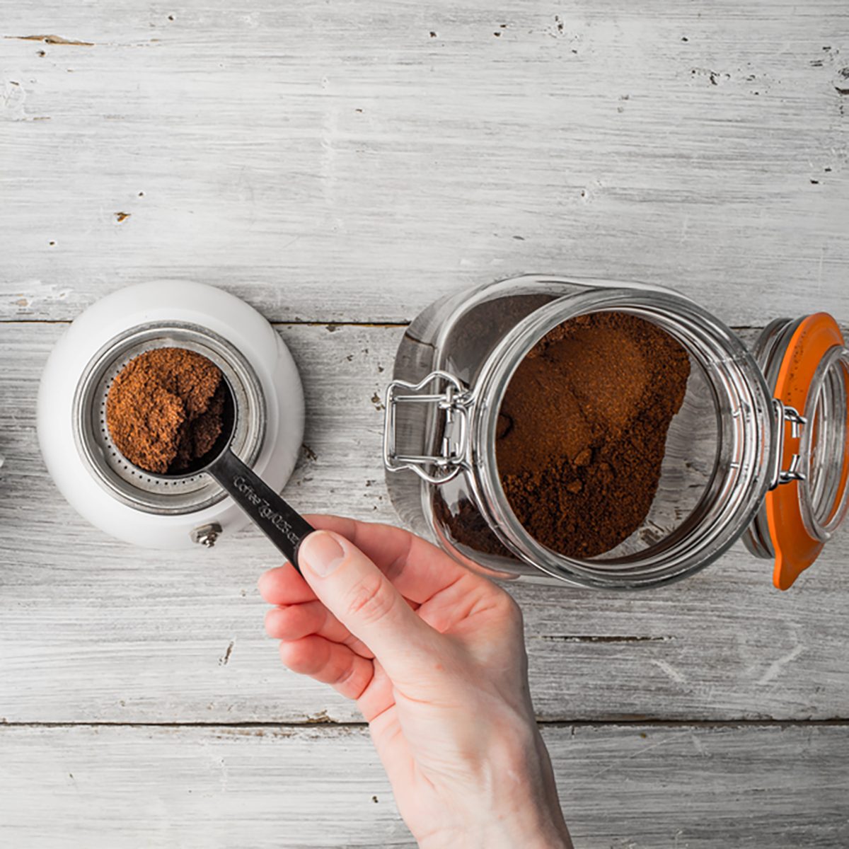 Making coffee set on the white wooden table top view
