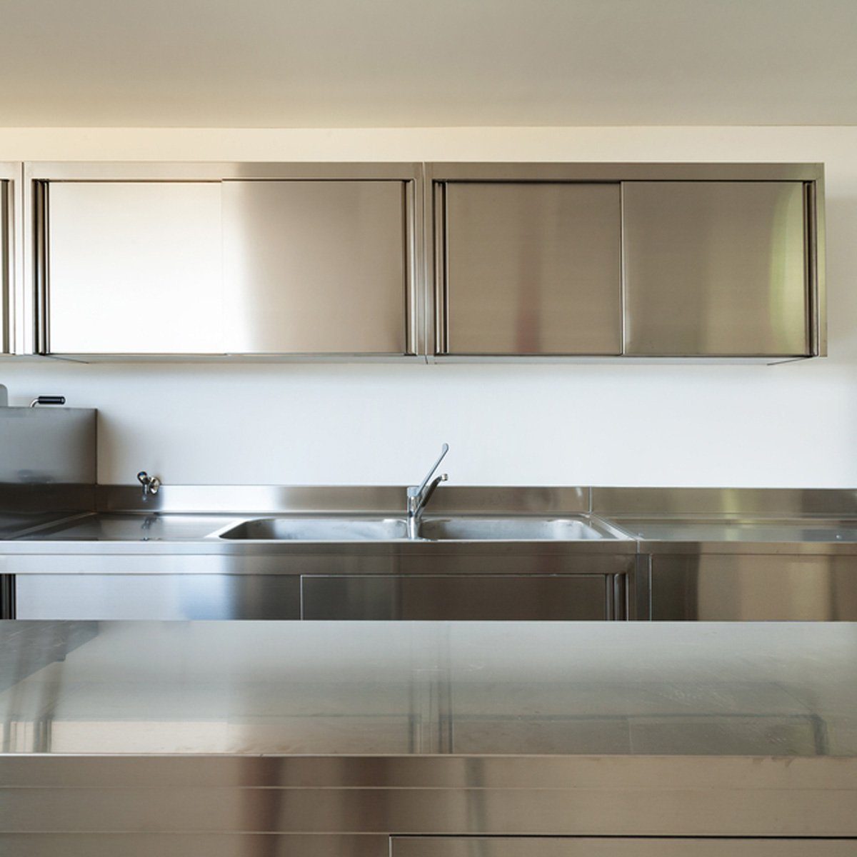 shutterstock_149525462 stainless steel new countertop restaurant kitchen