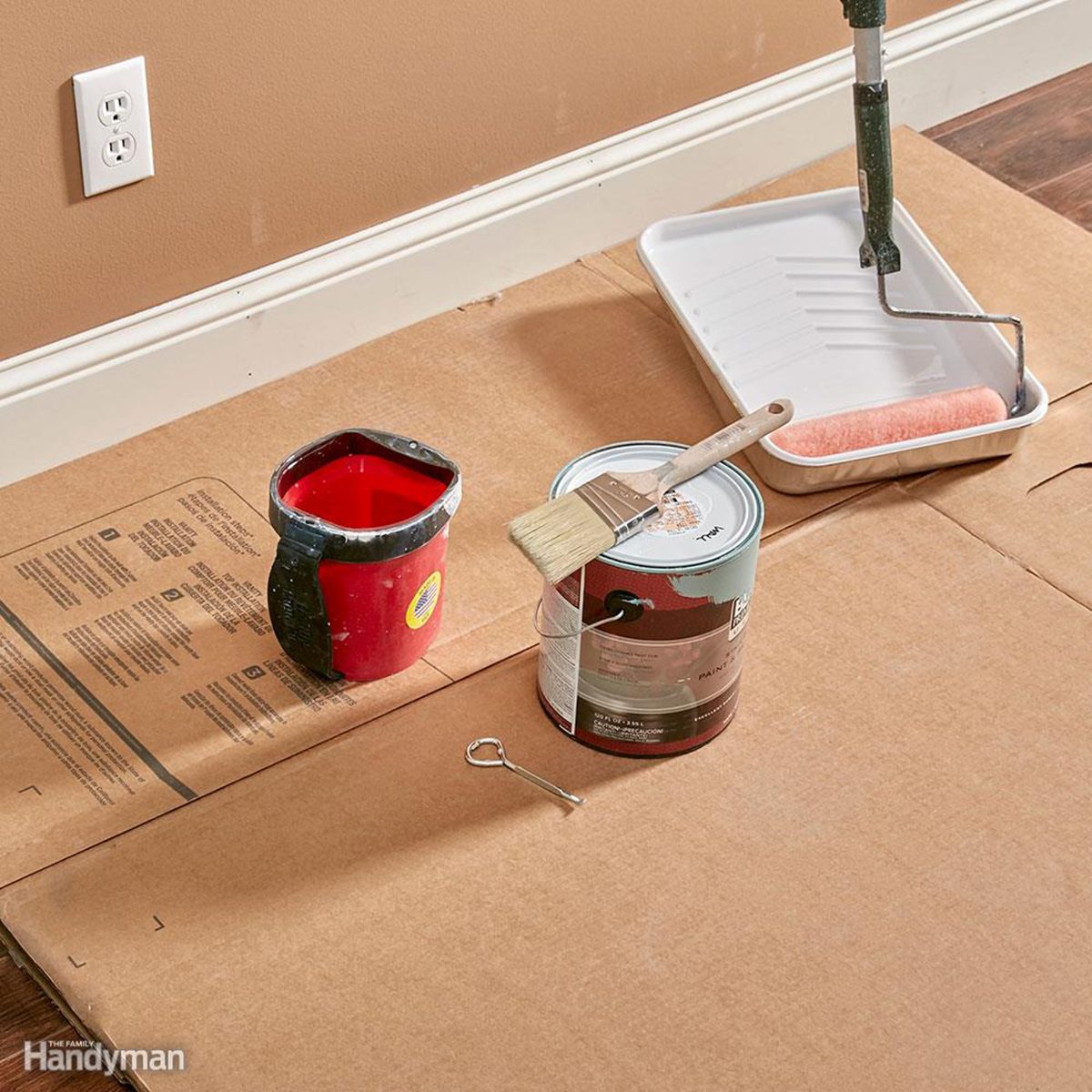 Cardboard on floor to protect it from paint