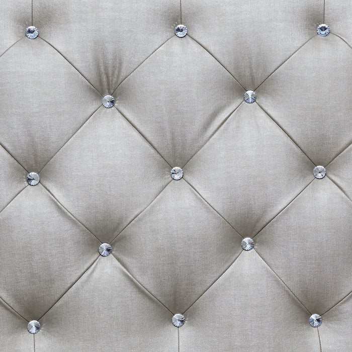 White couch cushions, background patterns.