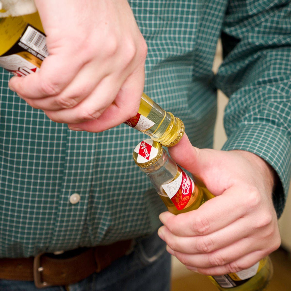 Opening a bottle with a bottle