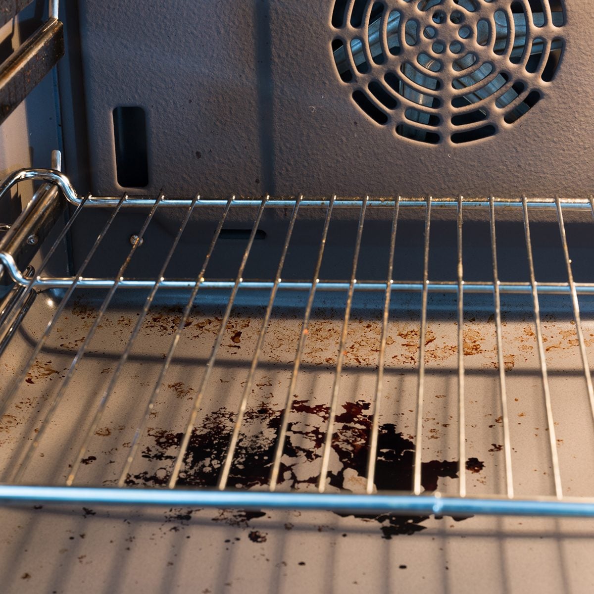 Dirty kitchen oven; Shutterstock ID 390265228