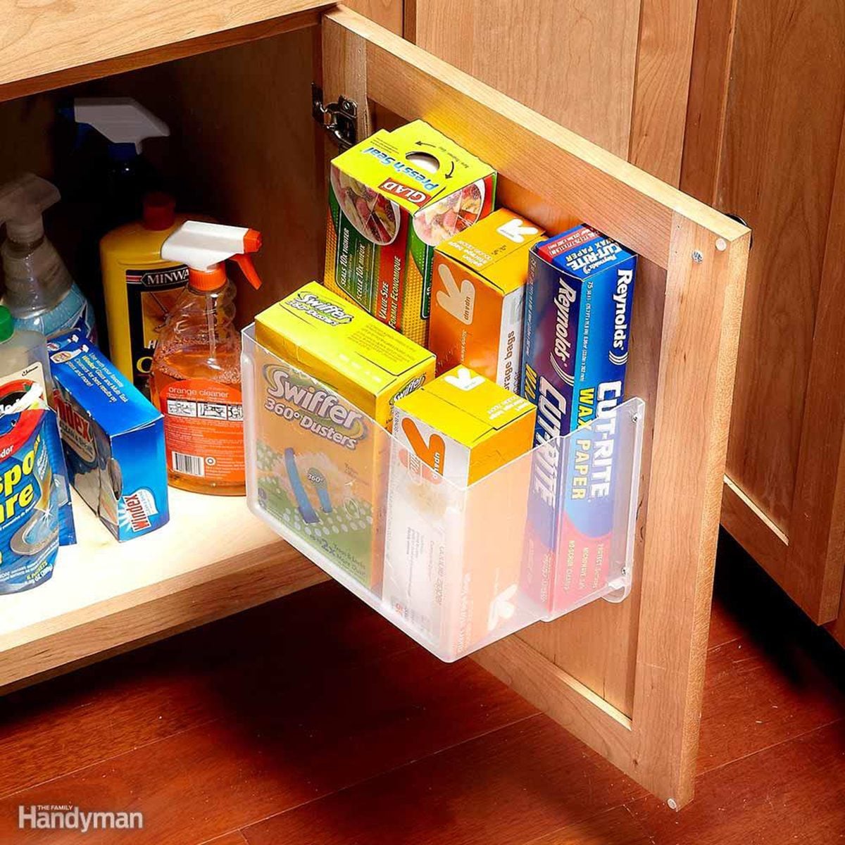 Boxes in a shelf on the door of a cabinet