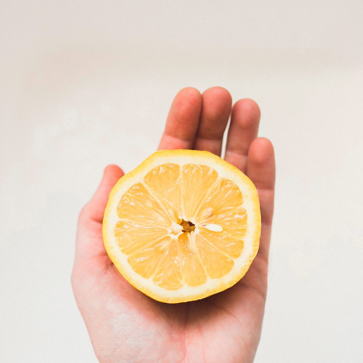 Holding a lemon