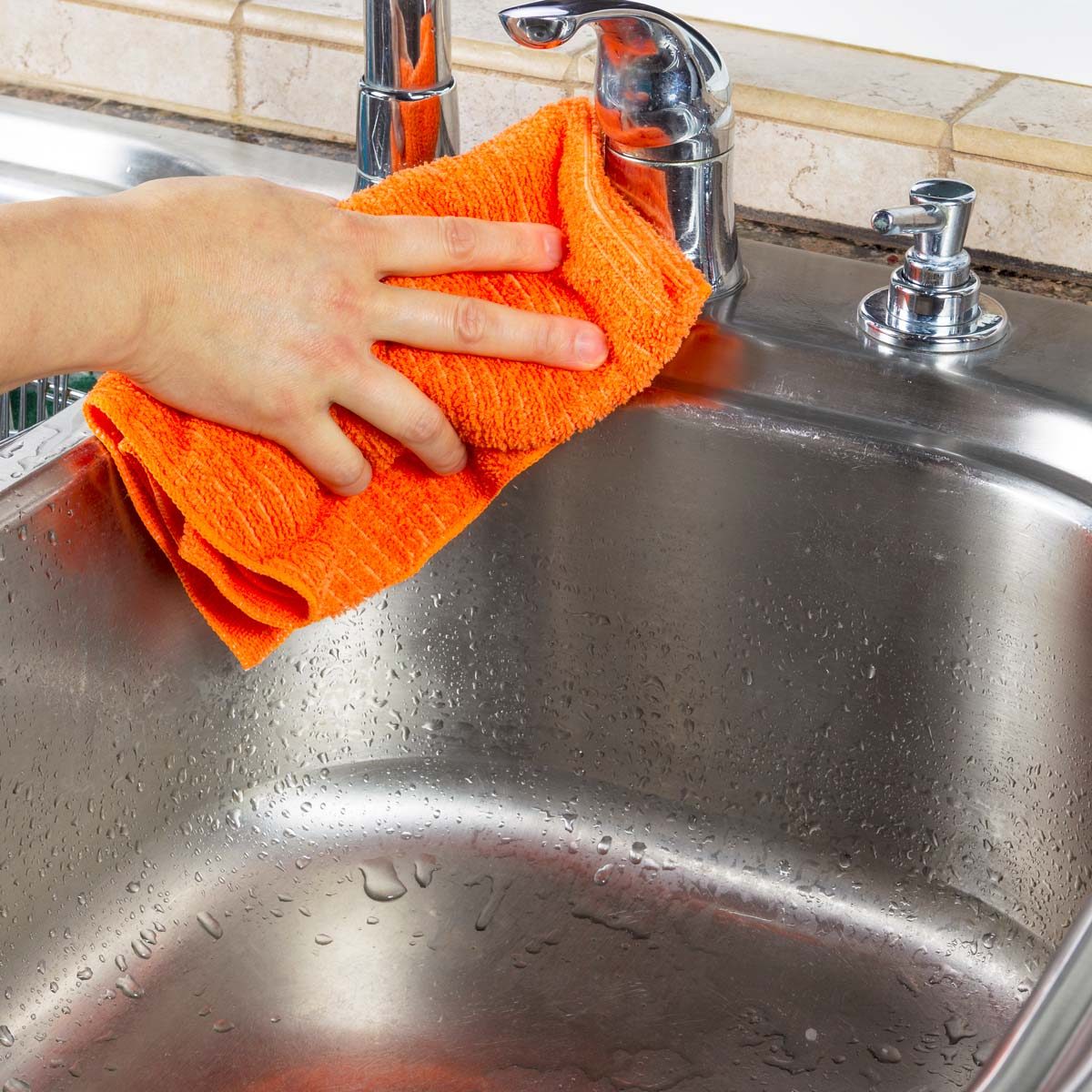 Wiping down a wet sink