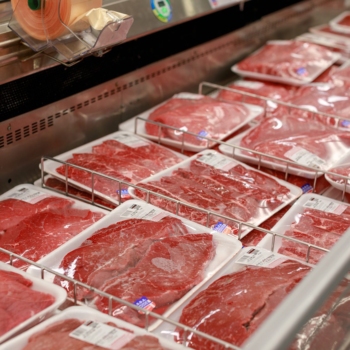 Portland, Oregon - Sep 8, 2018 : Costco wholesale warehouse shopping aisle for meats, a members only club.; Shutterstock ID 1176495496; Job (TFH, TOH, RD, BNB, CWM, CM): TOH