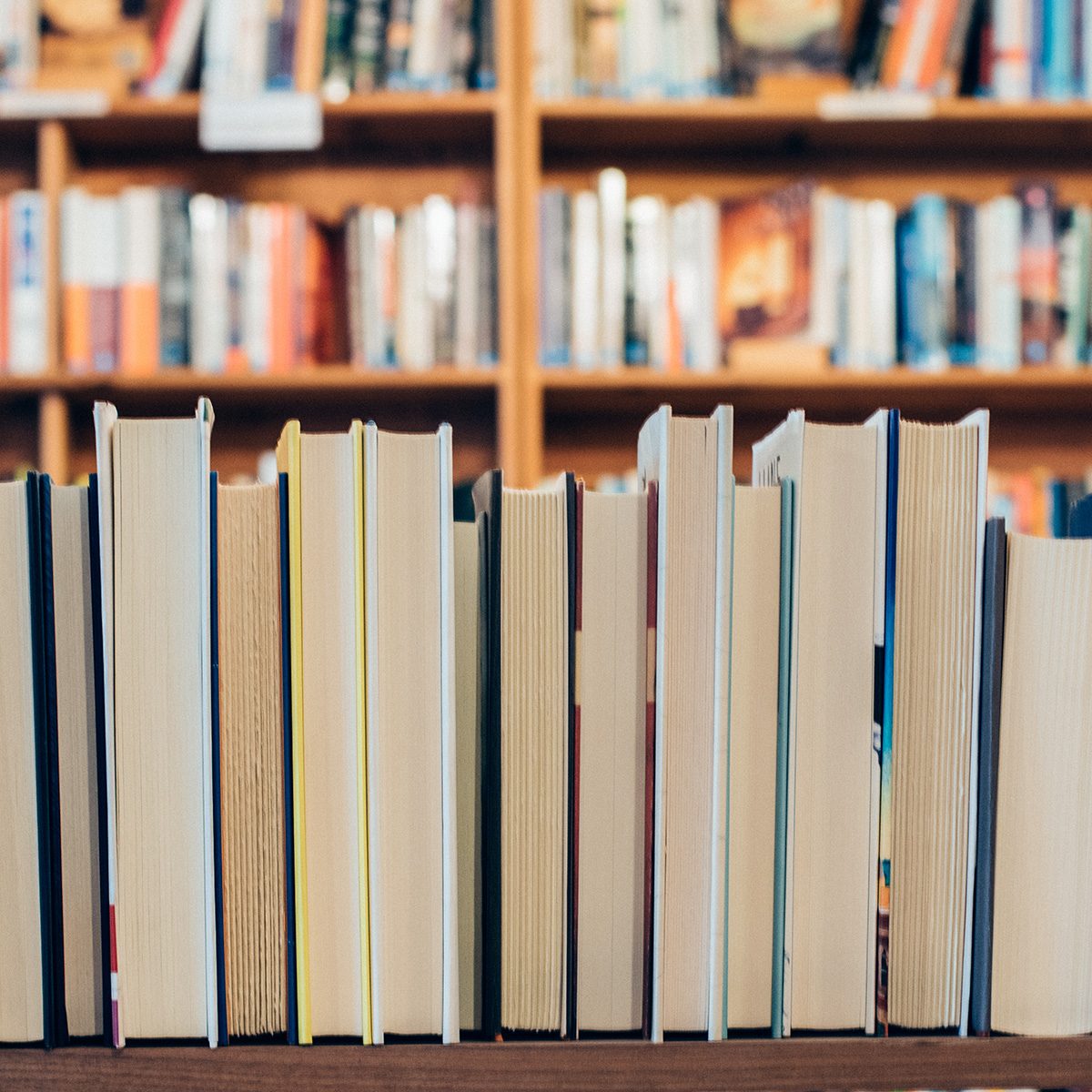 Row of backwards books in a bookstore