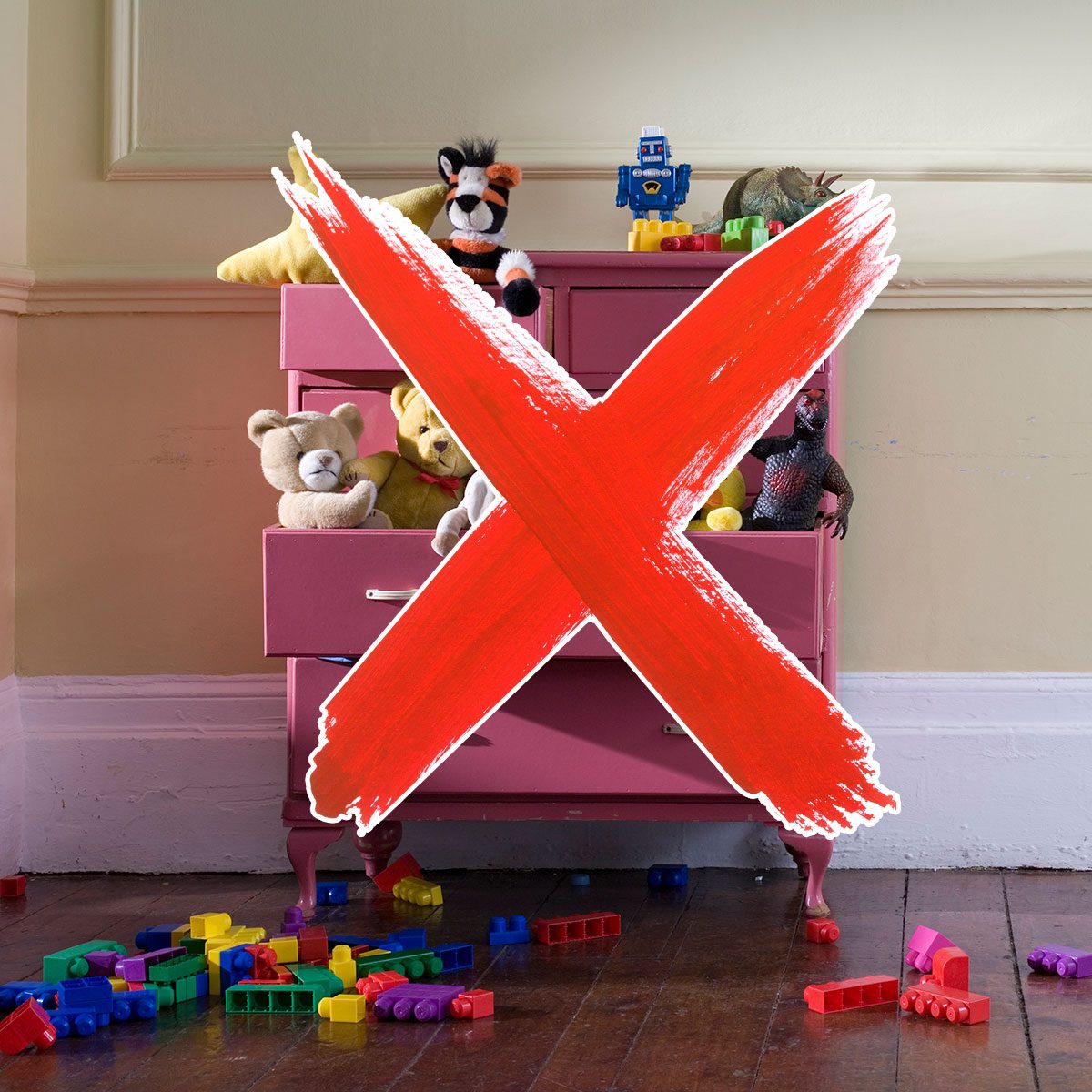Dresser filled with toys and a red 