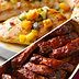 The Difference Between Barbecuing and Grilling