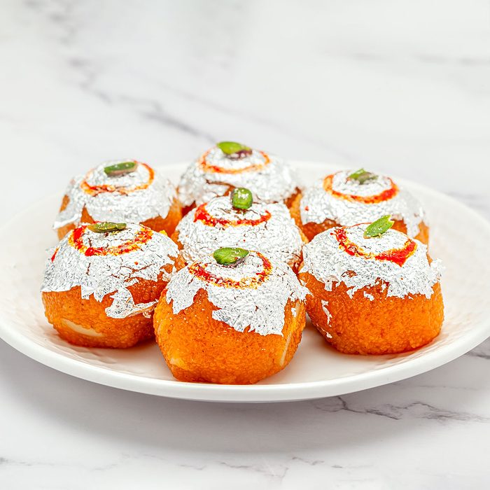 Motichoor Ladoo In White Ceramic Plate On Marble Surface