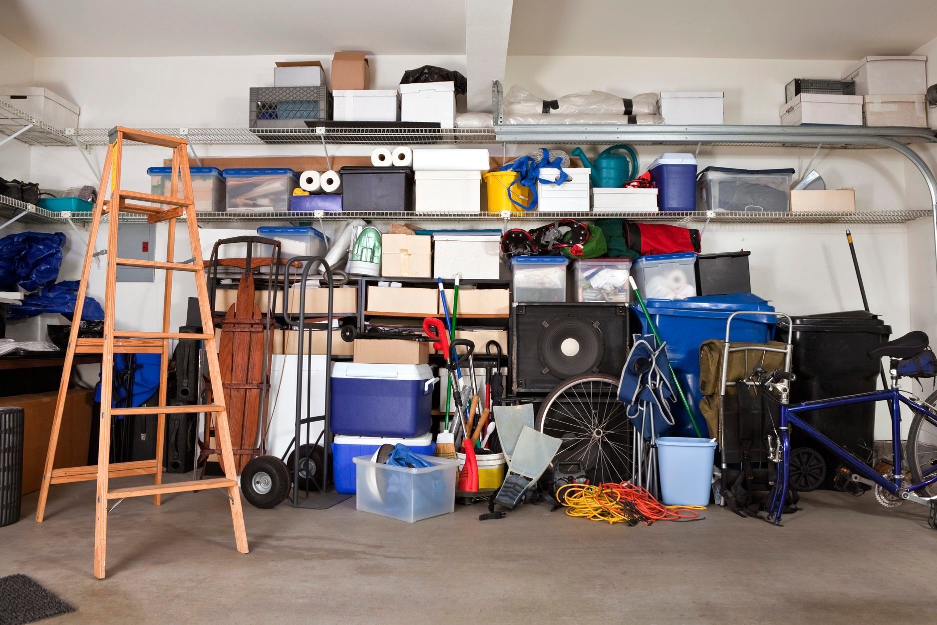 Stacks Of Organizing Equipment crowding the basement