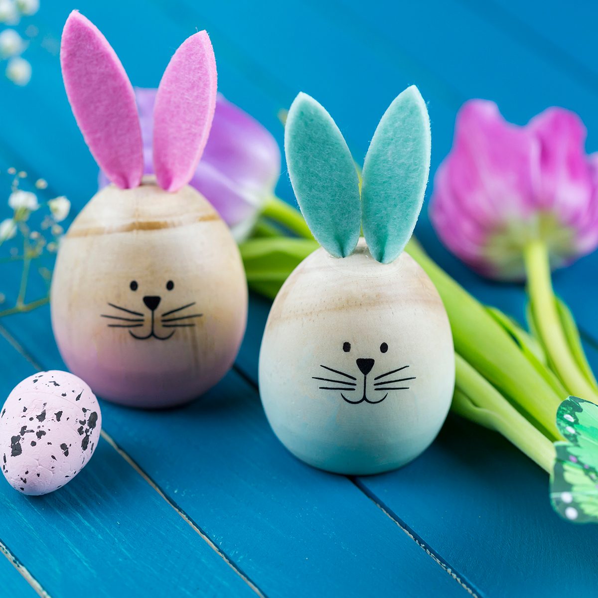 Two Painted Easter Eggs With Rabbit Ears