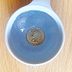 This Is Why People Leave a Quarter in a Cup of Frozen Water in the Freezer