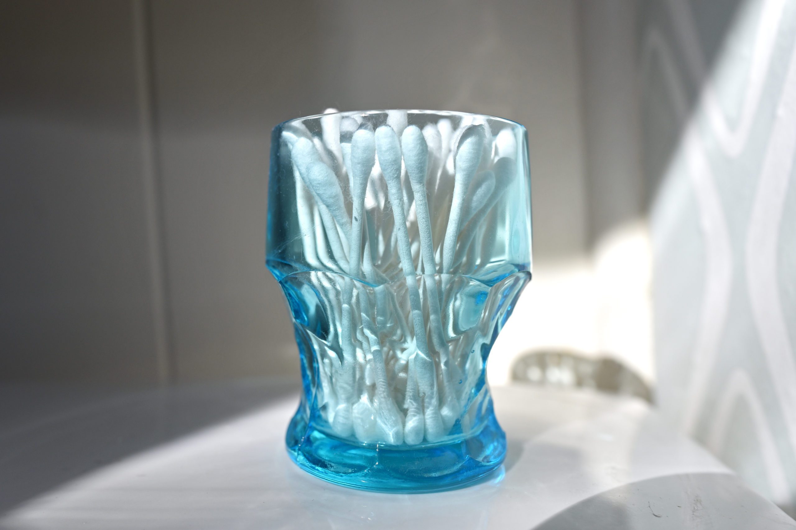 q-tips in glass