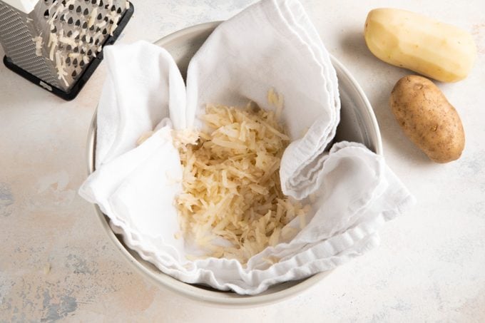 squeeze out potato liquid
