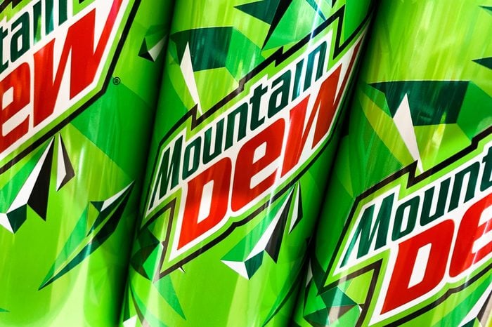 three mountain dew cans close up