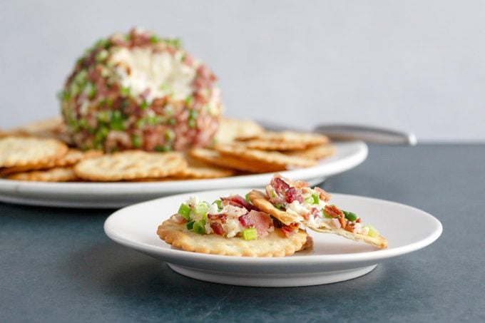 crackers with cheese spread onto it