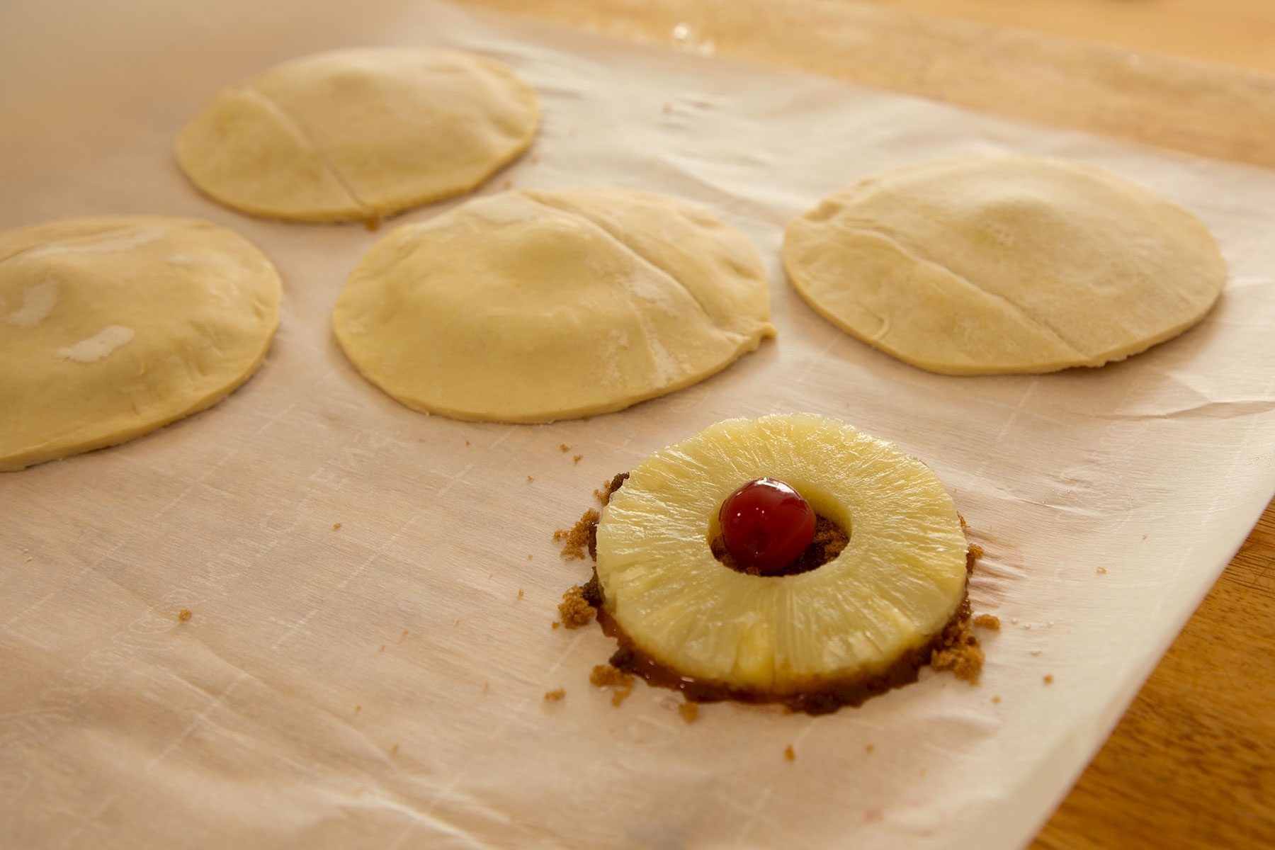 Baking Sheet Prepped Pineapple Upside Down Pastries Adrienne Peña For Toh