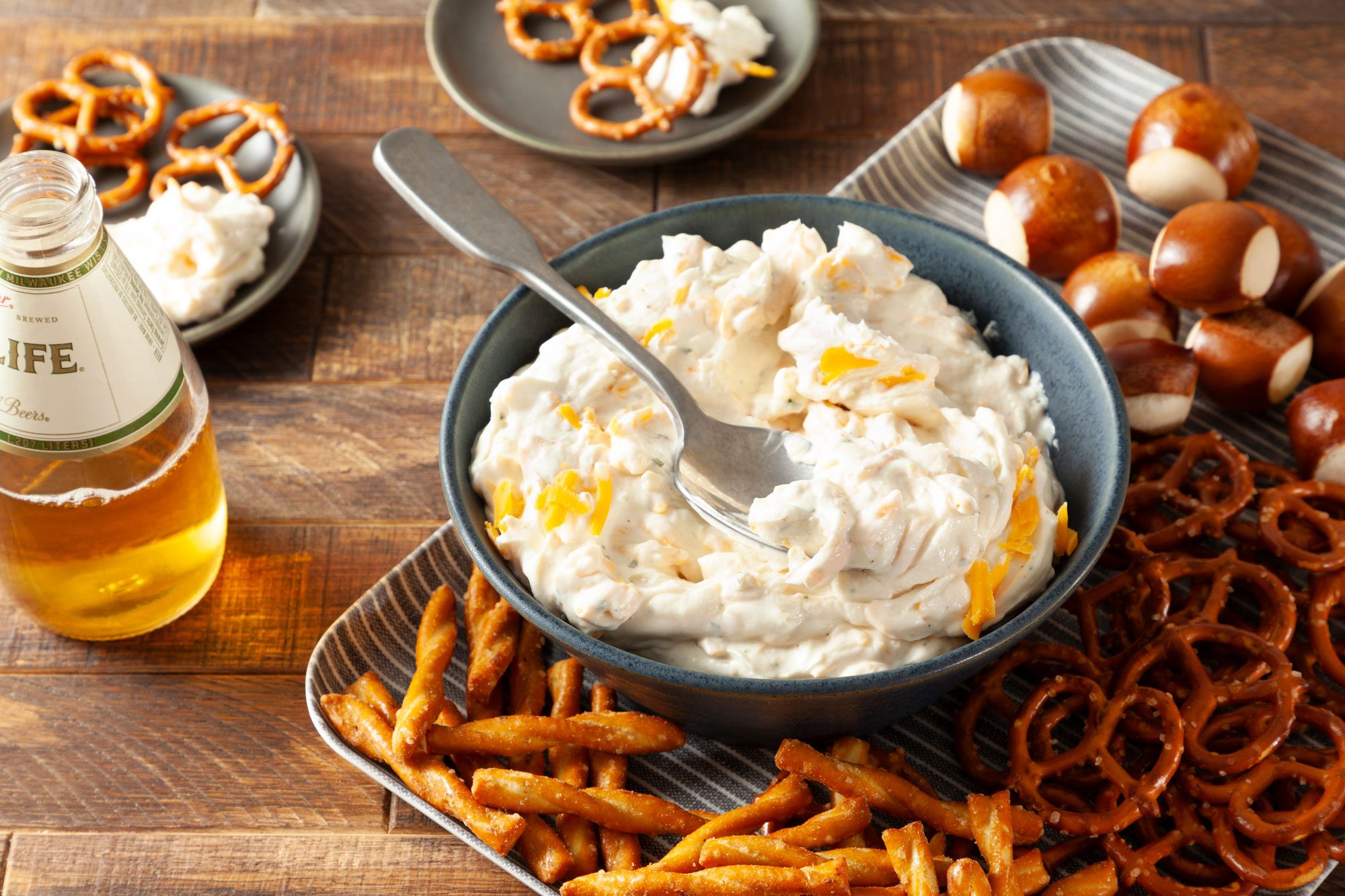 Mix cream cheese, ranch dressing mix and cheddar cheese in a large bowl