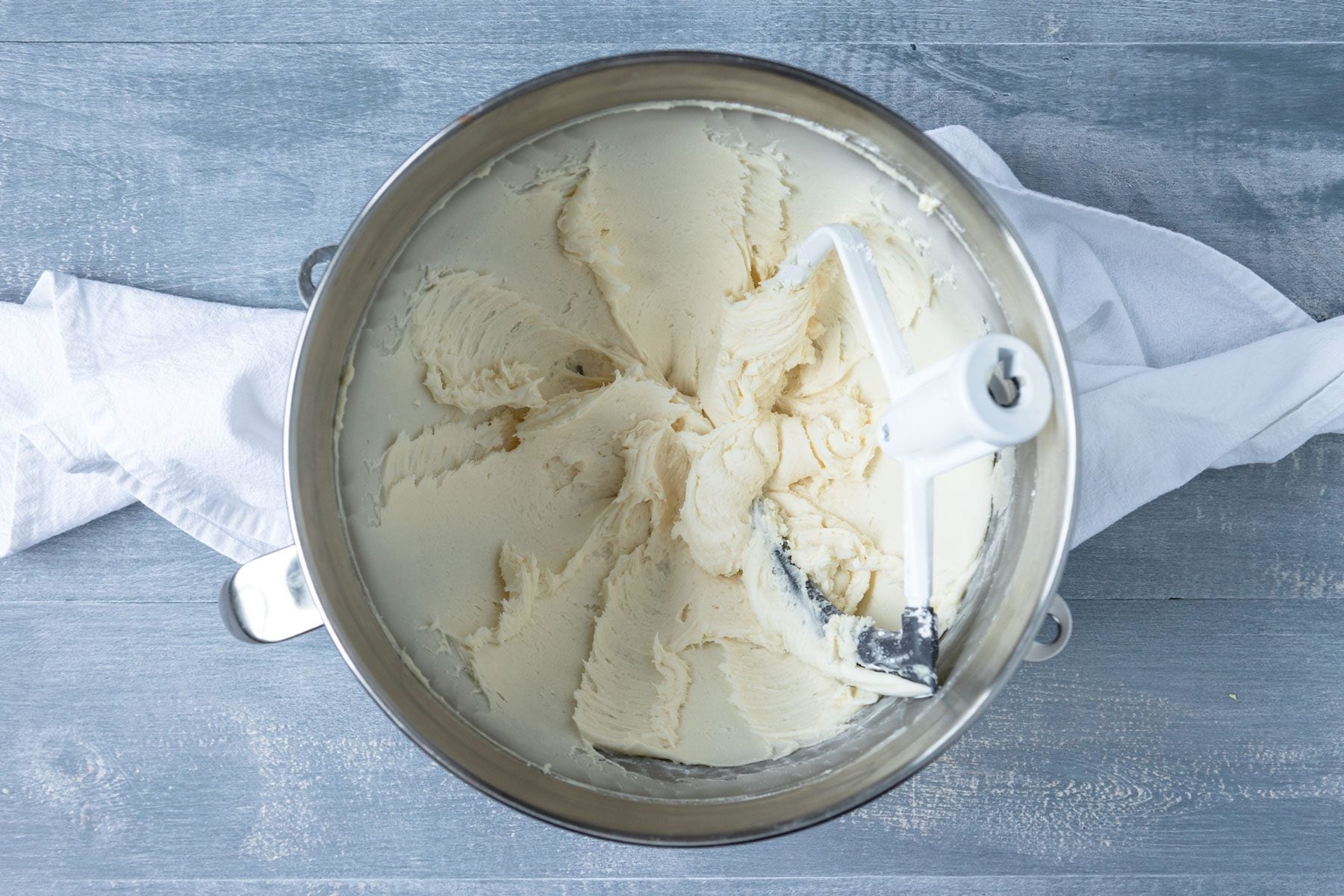 cheese and softened butter in the mixture bowl