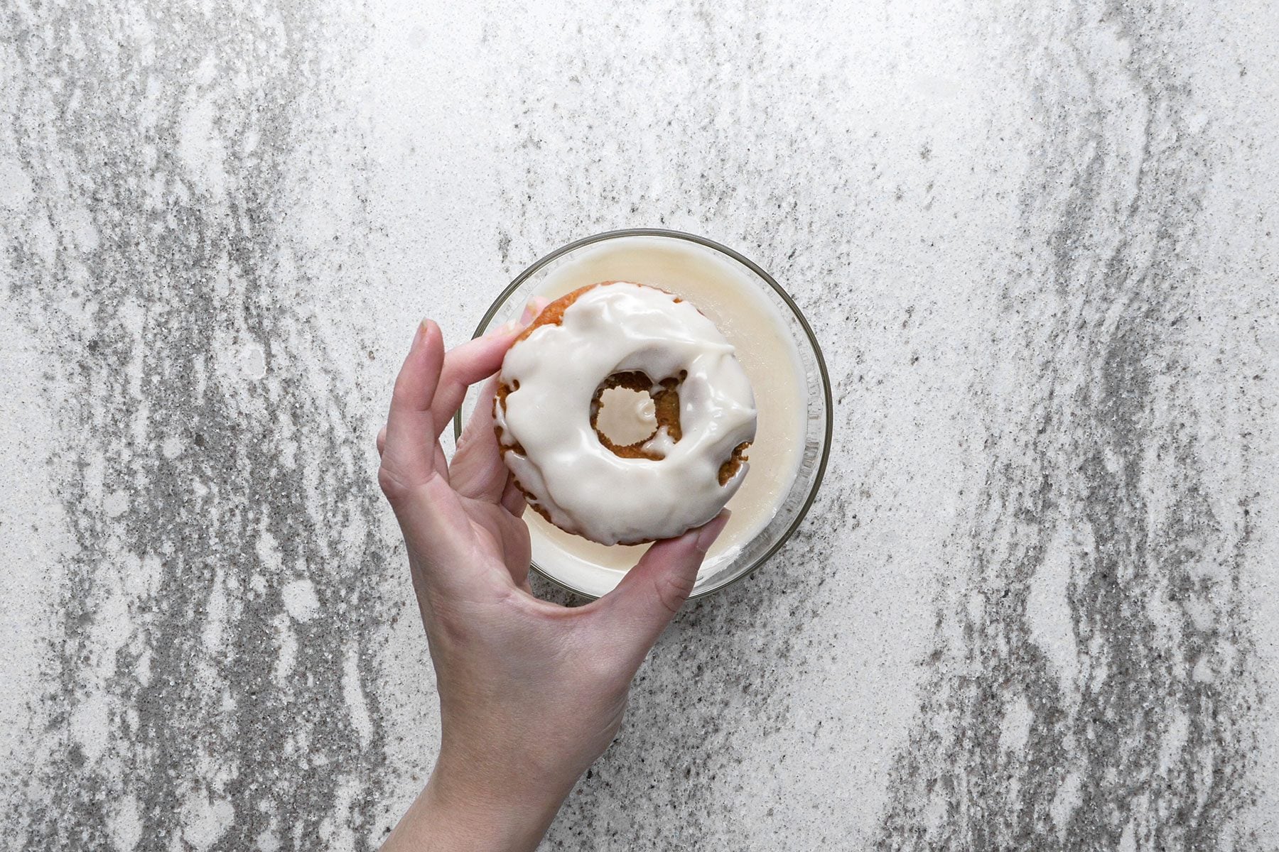 Glazing the doughnuts
